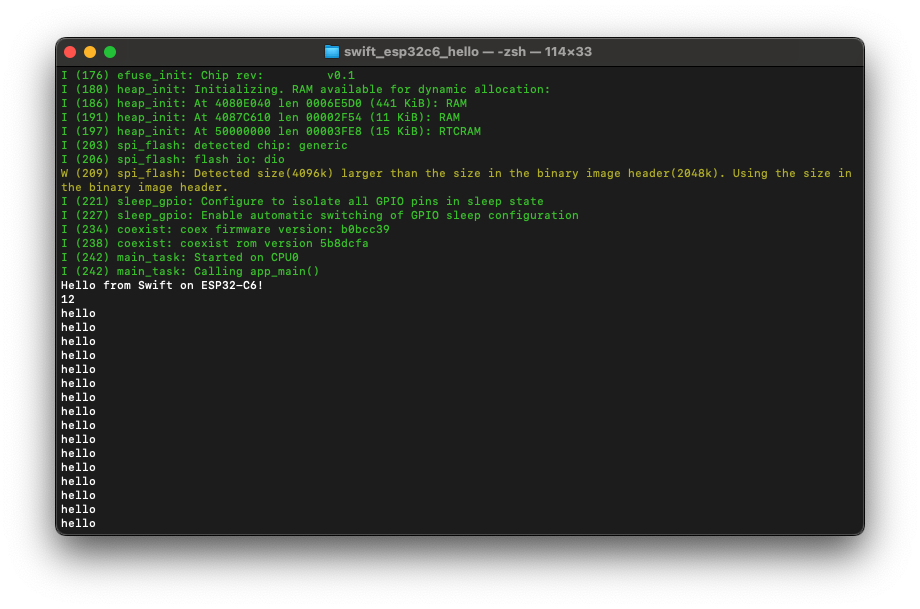 screen shot of a terminal window with the word hello printed repeatedly below green setup text from the esp-idf